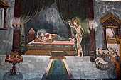 Chiang Mai - Wat Phra That Doi Suthep. The walls of the gallery are covered with Buddha statues and mural paintings of Jataka and tales of the previous lives of the Buddha.